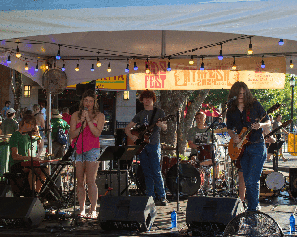 Artists perform on the KidsFest at AthFest 2024 stage.
